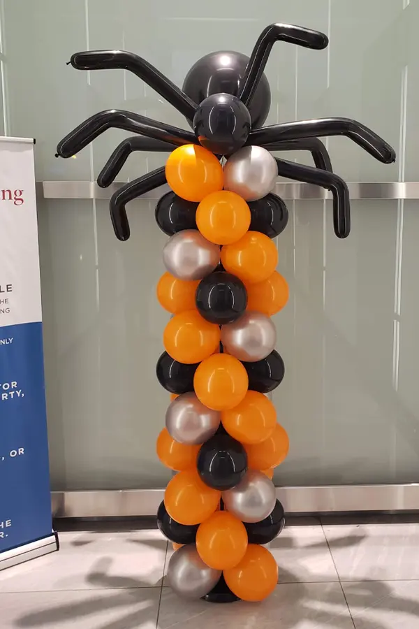 Spider topped balloon column