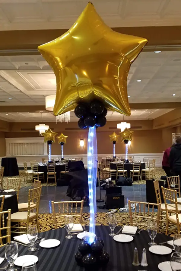 A decorative balloon star on an led light strand