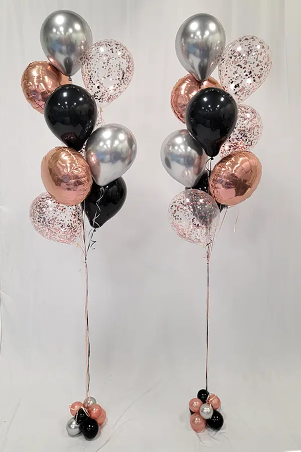 This bouquet is created with mix of different sized balloons in solid colors creating an impactful balloon bouquet perfect for room and entryway decor