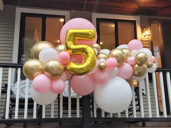 Organic balloon garland with custom logo or wording added to the balloons