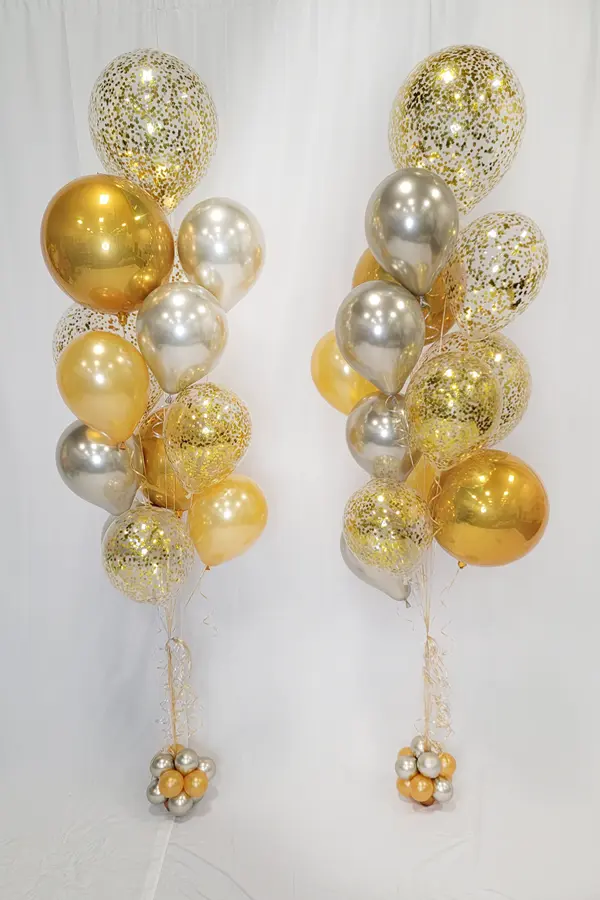 Glitter filled balloons paired with foil and latex balloons to create a dazzling bouquet