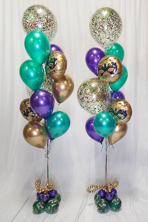 A festive balloon bouquet with Mardi Gras accents