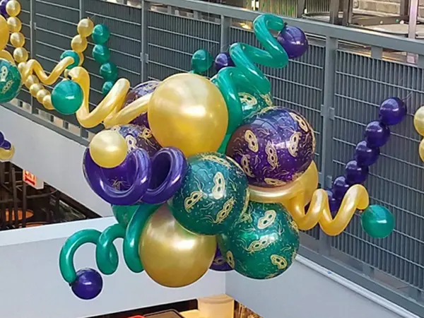 Hanging squiggle accented balloon topiary