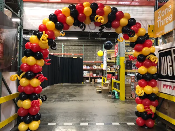 Classic balloon arch with squiggle balloon accents