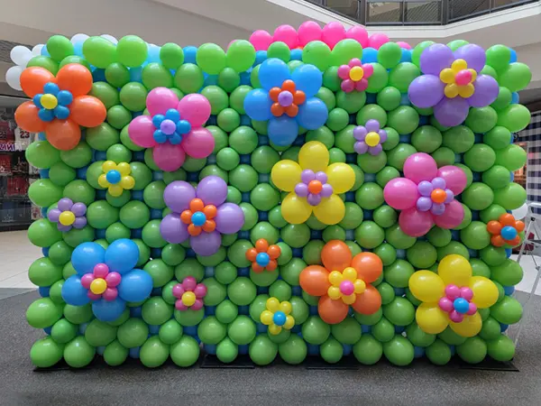 Stunning balloon wall with flowes perfect for backdrops and photo areas