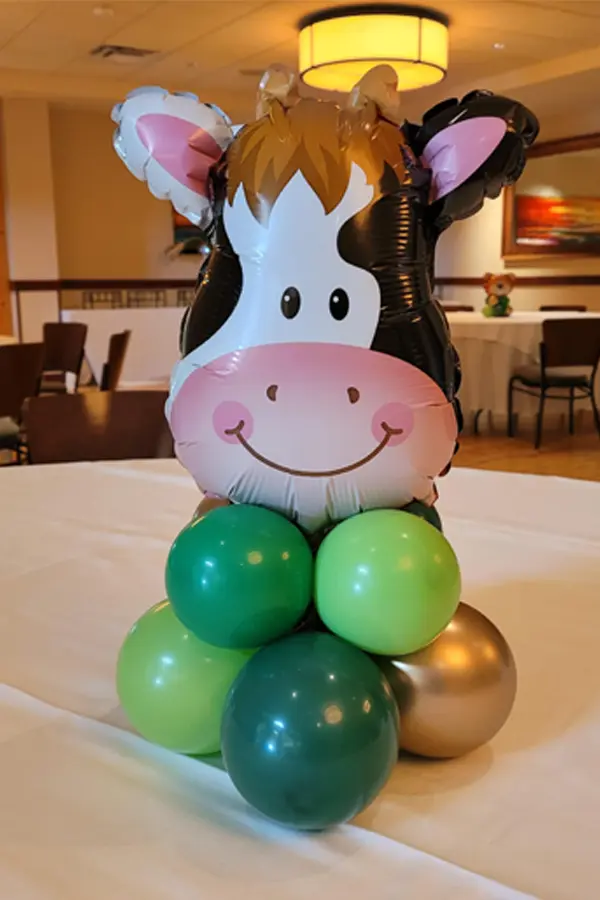 Small balloon centerpieces with mini foil balloon shapes