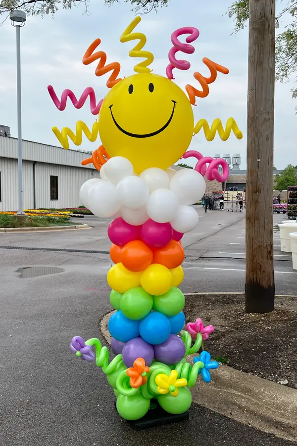 7.5ft sun and rainbow balloon column
