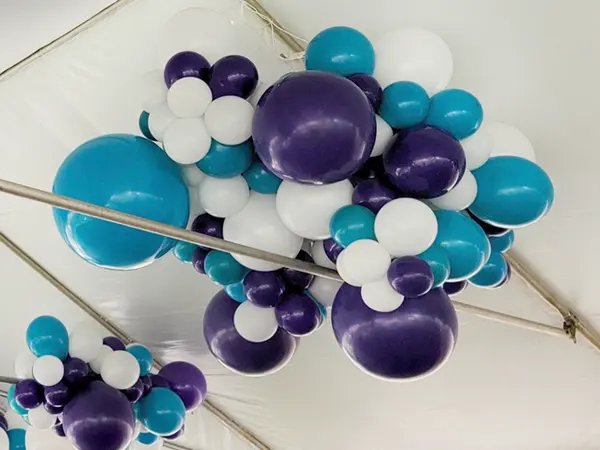 Decorate the roof of your party tent or add some color to the ceiling of large venues with cloud like balloon decor