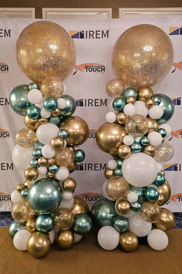 Organic styled balloon column with glitter balloon accents