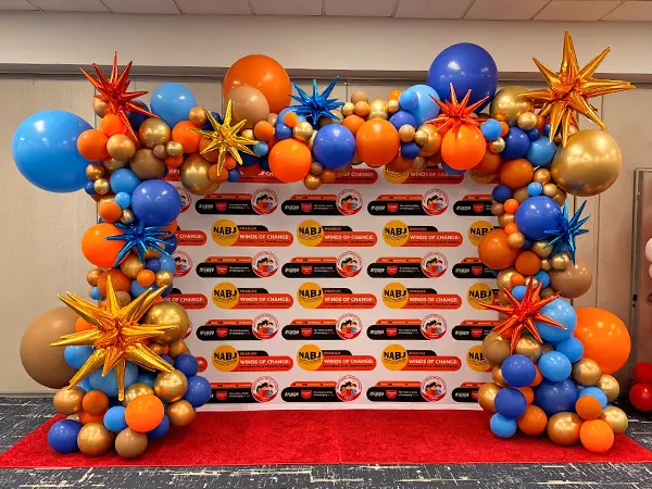 8ftx10ft Squared organic styled balloon arch with foil starburst accents