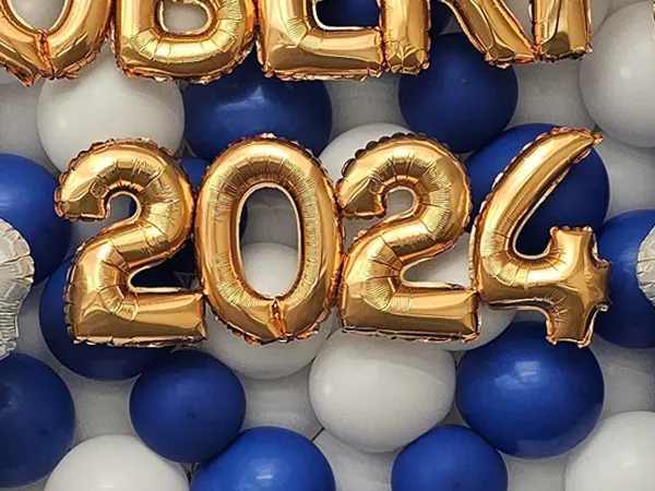 Foil letters in gold to spell out the event year