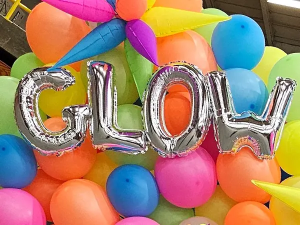 Foil letters in silver to spell out the event name