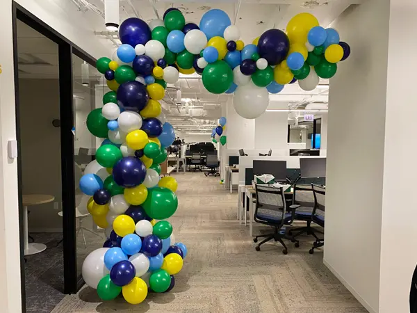 A freestanding balloon wave is a fashionable alternative to the classic look of balloon arch