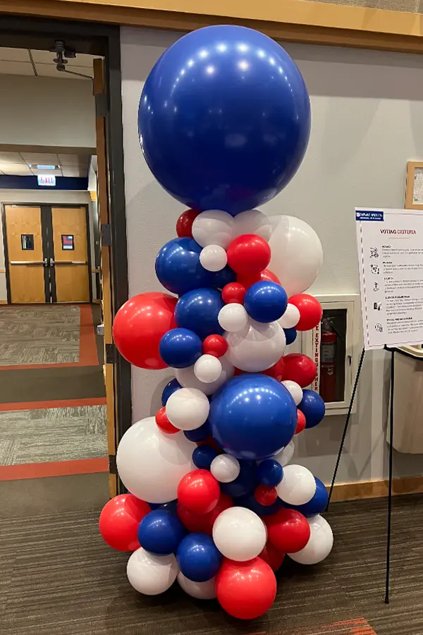 Classic balloon column great for indoor or outdoor use with a fun firework topper