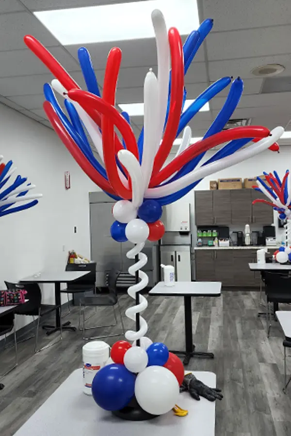 Enjoy the fun of fireworks indoors with balloon centerpieces