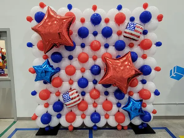 Staying true to red white and blue with this patriotic balloon wall display