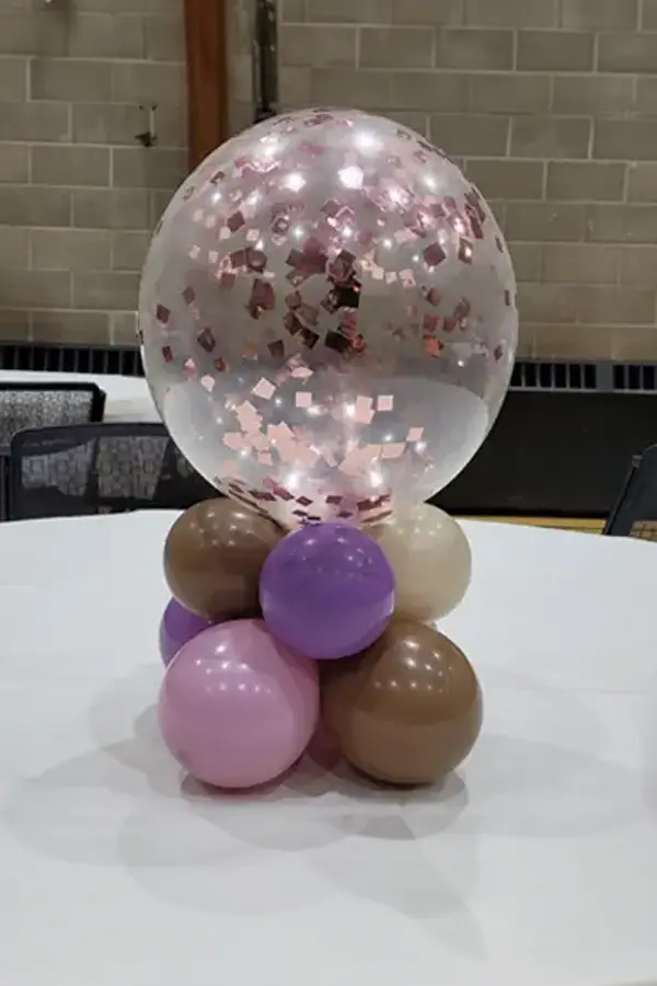 A simple latex balloon centerpiece filled with glitter