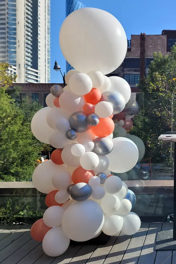 7.5ft tall organic balloon column with a jumbo round topper
