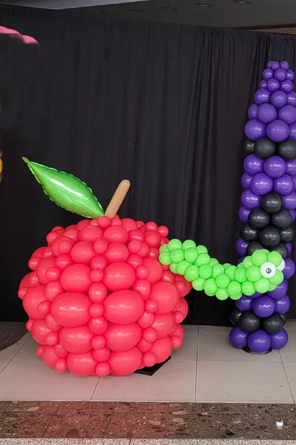 Worm in an apple balloon art for back to school