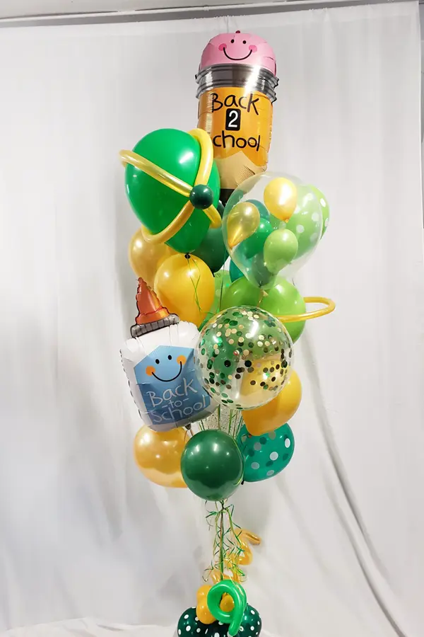 Tommy's Signature balloon bouquet with a back to school theme