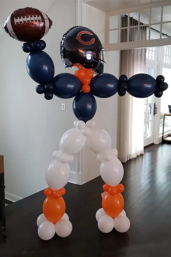 Football player balloon sculpture