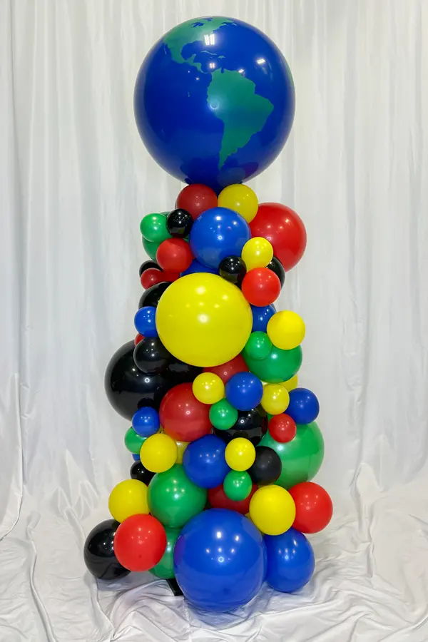 Organic balloon column with globe printed balloon topper for global sports celebrations