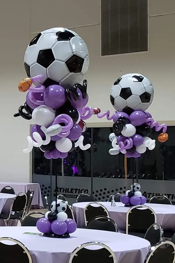 Towering balloon centerpiece with a sport theme