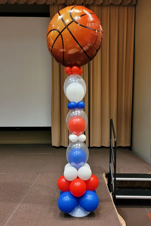 7.5ft tall skinny balloon column with jumbo foil topper