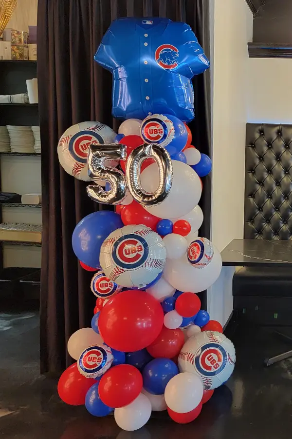 7.5ft tall themed organic balloon column with MLB foil topper