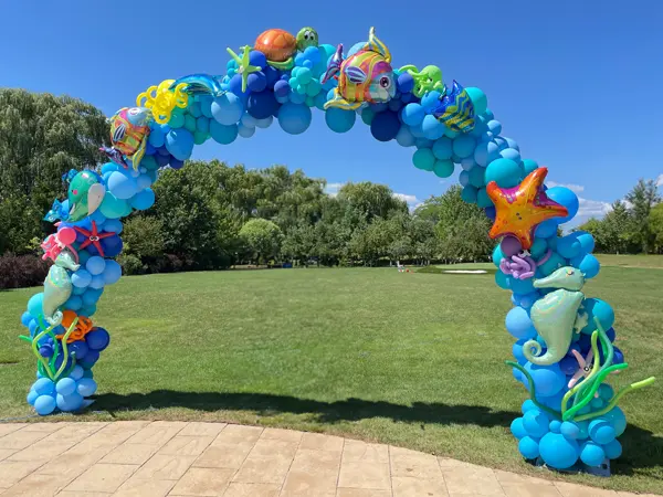 16ft wide balloon arch with aquatic themed foil accents