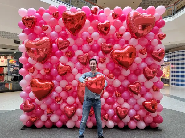 Valentine's Day balloon wall perfect for a photo shoot