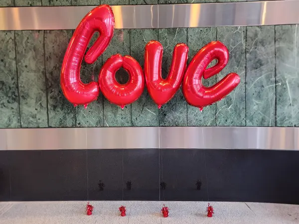 Foil balloon letters spelling out LOVE
