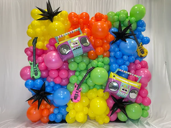 Neon 80s or 90s theme balloon wall