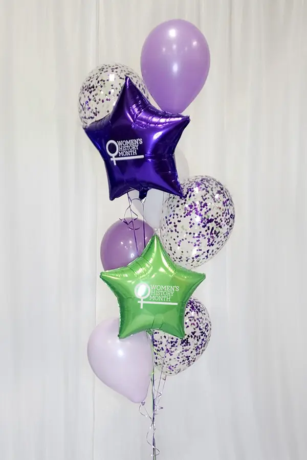 Sparkly balloon bouquet with Women's History Month logo